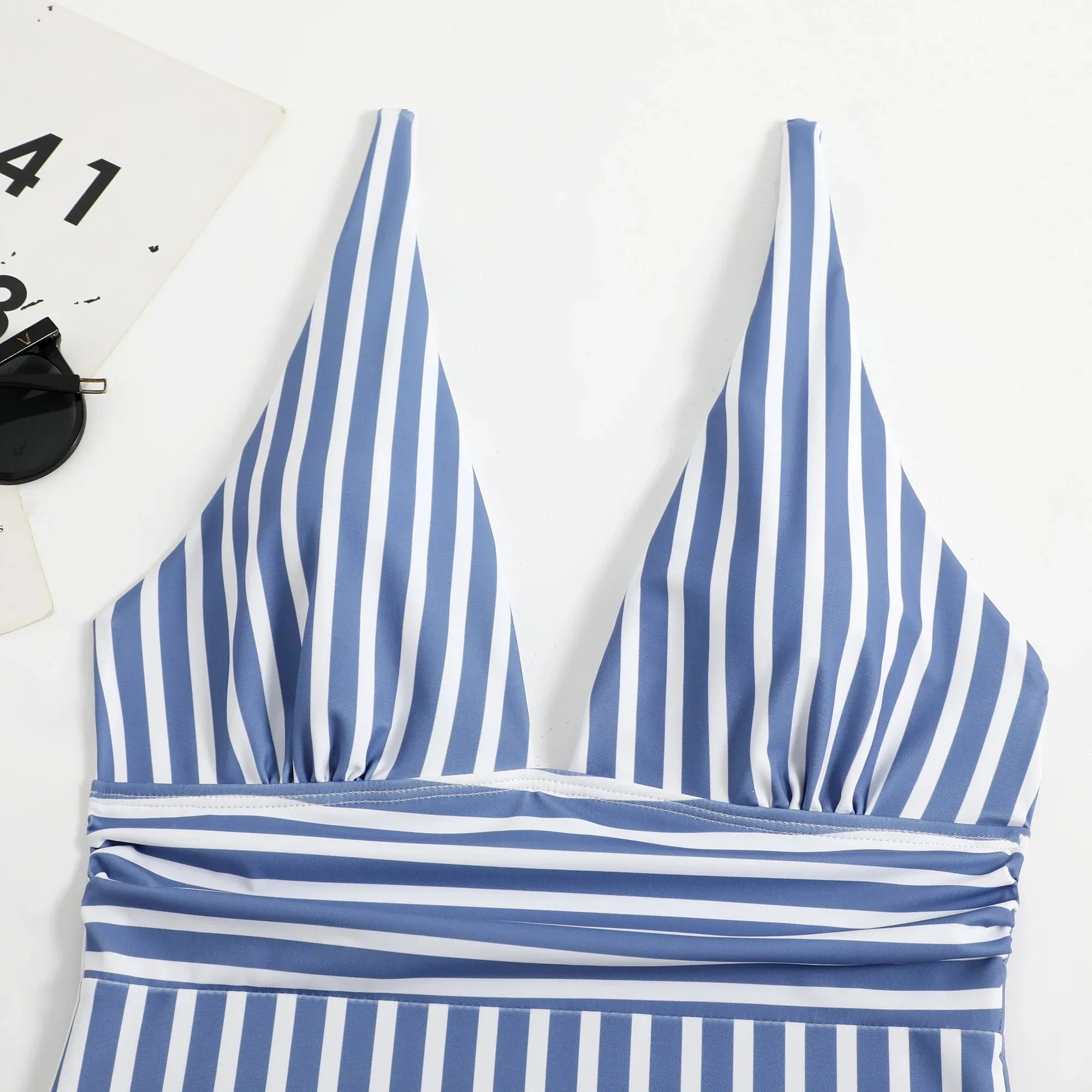 Trendy Stripe One-Piece Swimwear with Plunging Neckline