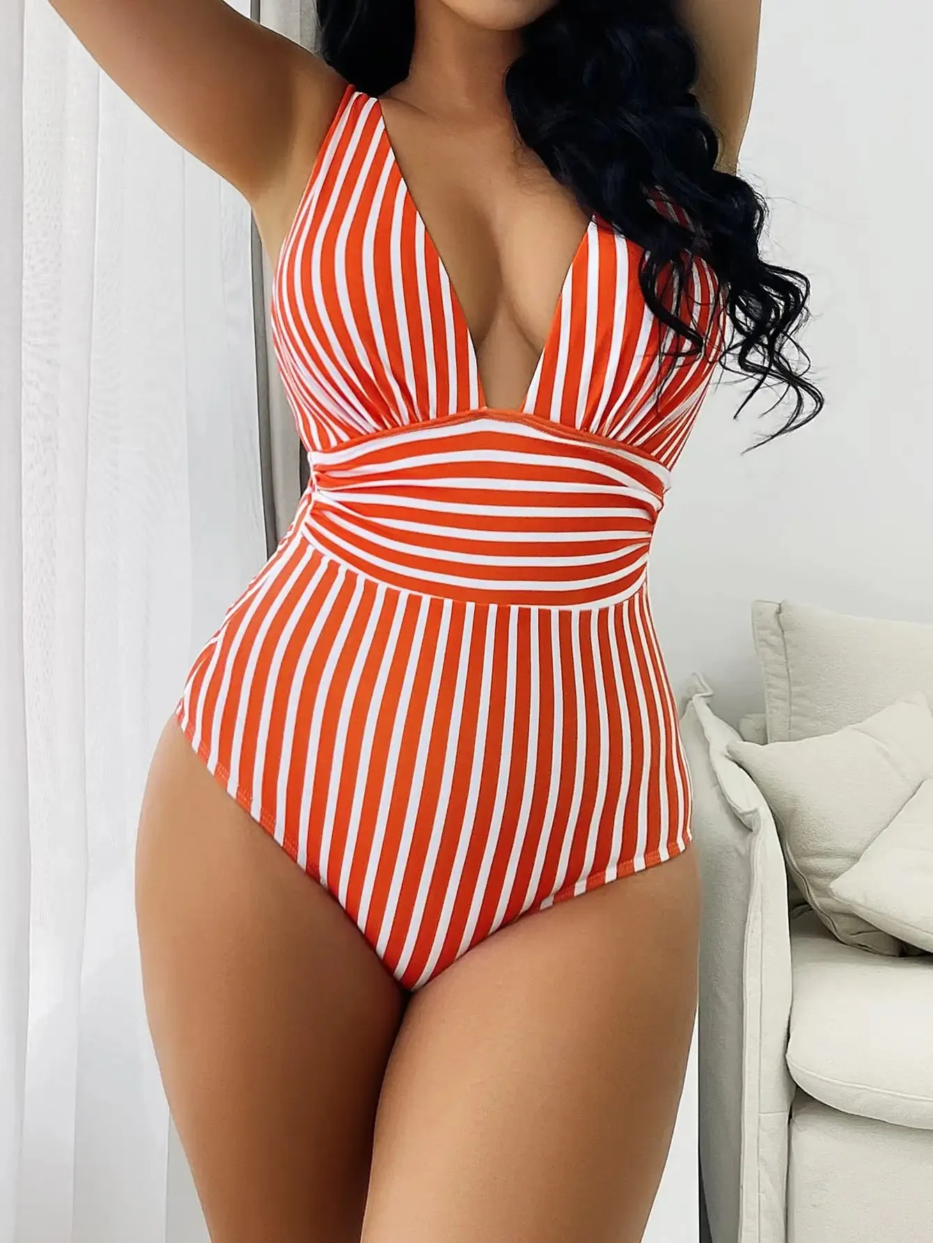 Trendy Stripe One-Piece Swimwear with Plunging Neckline